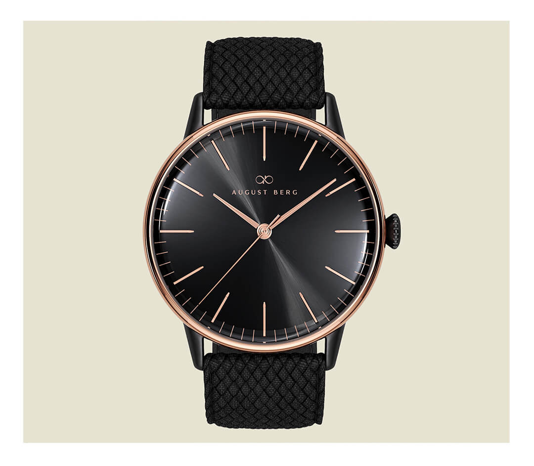 August Berg Serenity watch with a black dial and woven strap