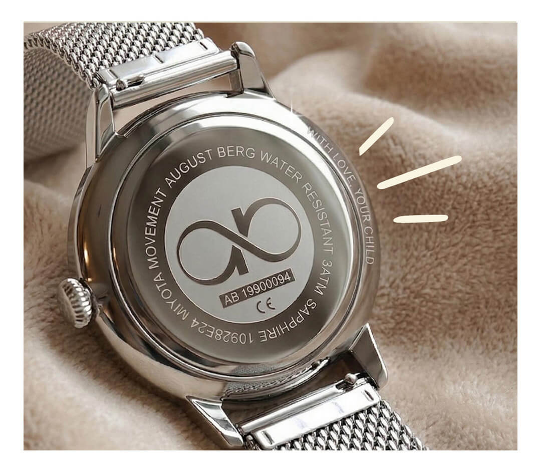 Engraved August Berg caseback reading With love, your child